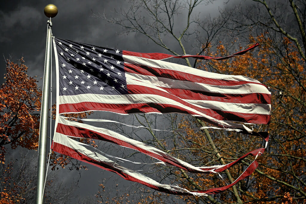 A tattered U.S. flag.