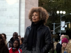 Activist Angela Davis stands in Washington State Park in New York surrounded by other activists during the Occupy Wall Street protests.
