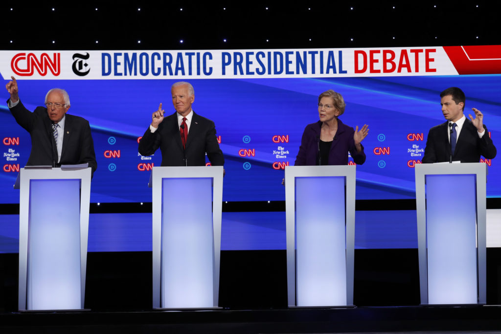 Bernie Sanders, Joe Biden, Elizabeth Warren, Pete Buttigieg at an Oct. 2019 presidential debate