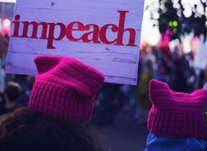 Protesters call for Trump's impeachment.