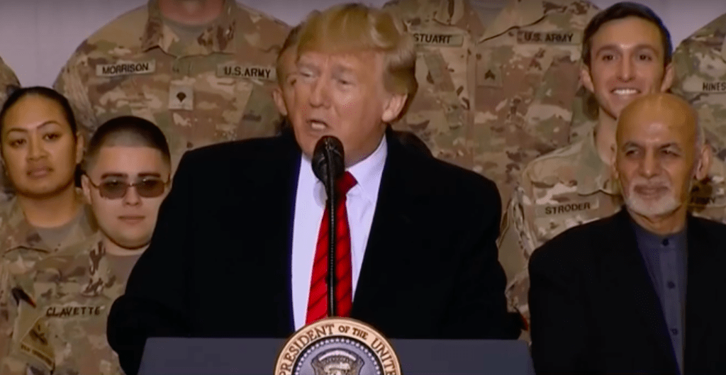 trump speaks in afghanistan in front of US troops and Afghan president