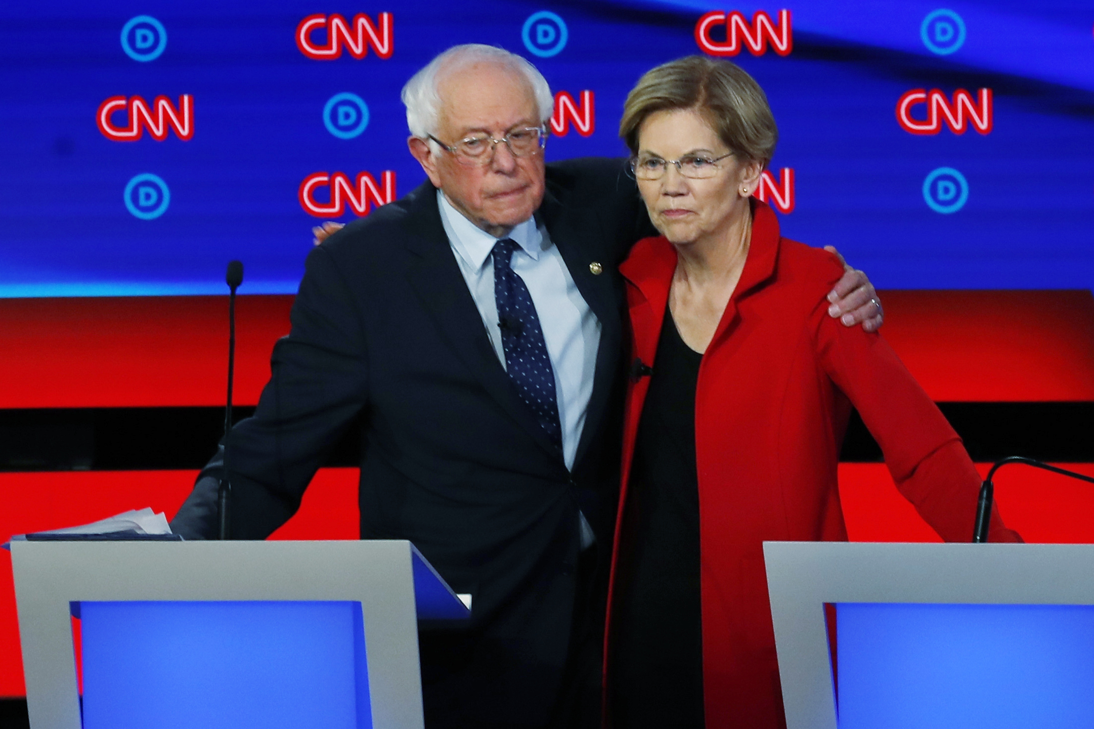 Sen. Bernie Sanders, I-Vt., embraces Sen. Elizabeth Warren, D-Mass.