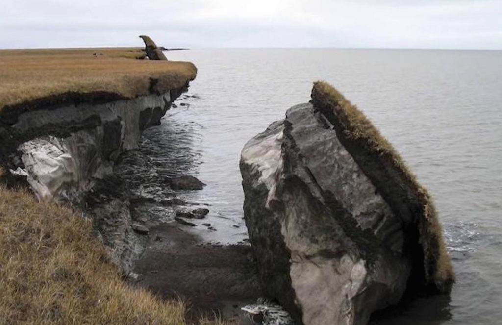 an Arctic cliff melting