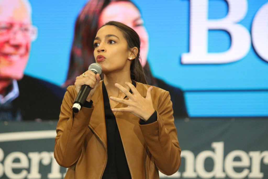 Rep. Alexandria Ocasio-Cortez campaigns with Sen. Bernie Sanders, I-Vt. in Council Bluffs, IA.