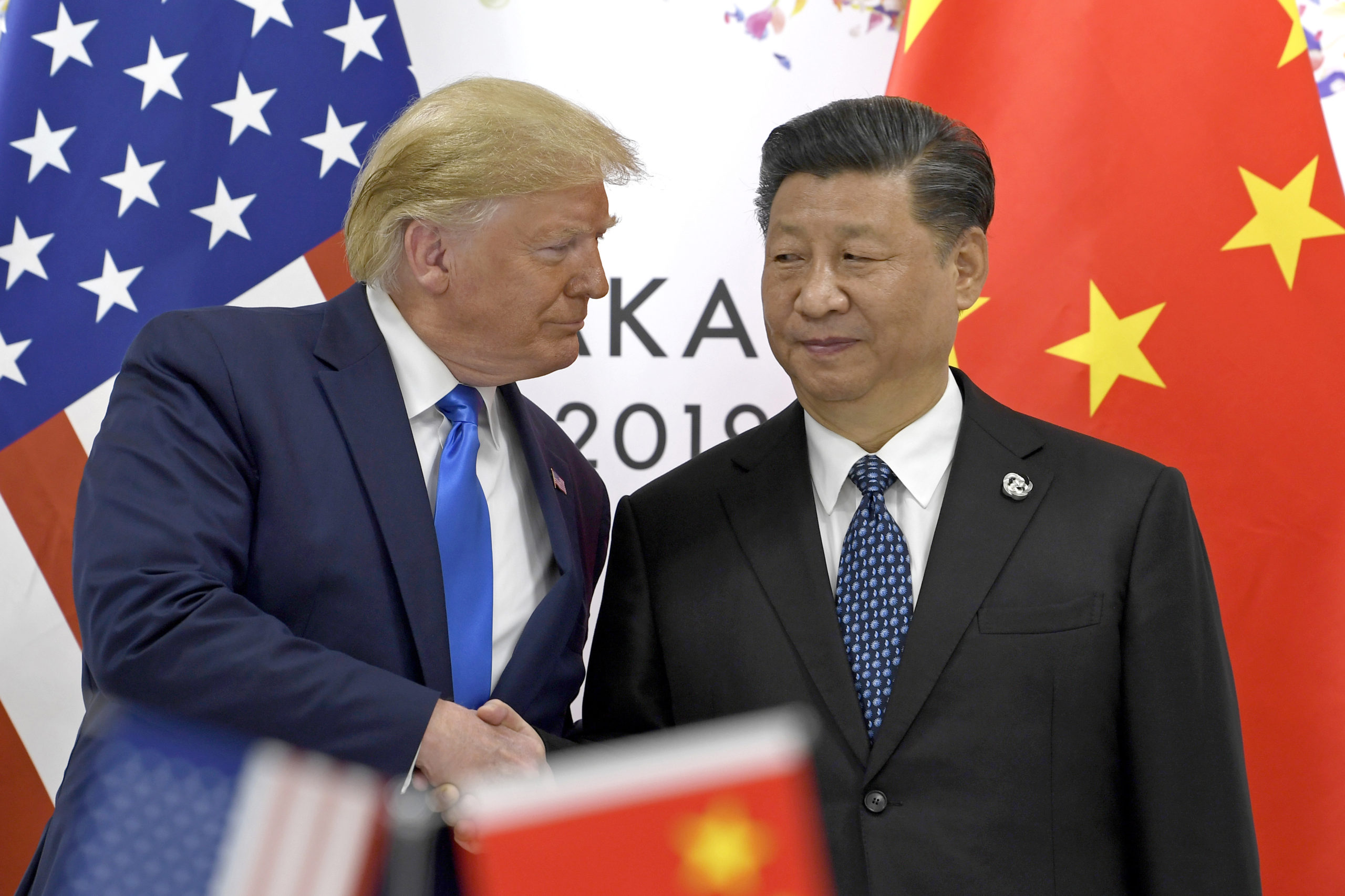 U.S. President Donald Trump greets Chinese President Xi Jinping at the G-20 summit in Osaka, Japan, last year.