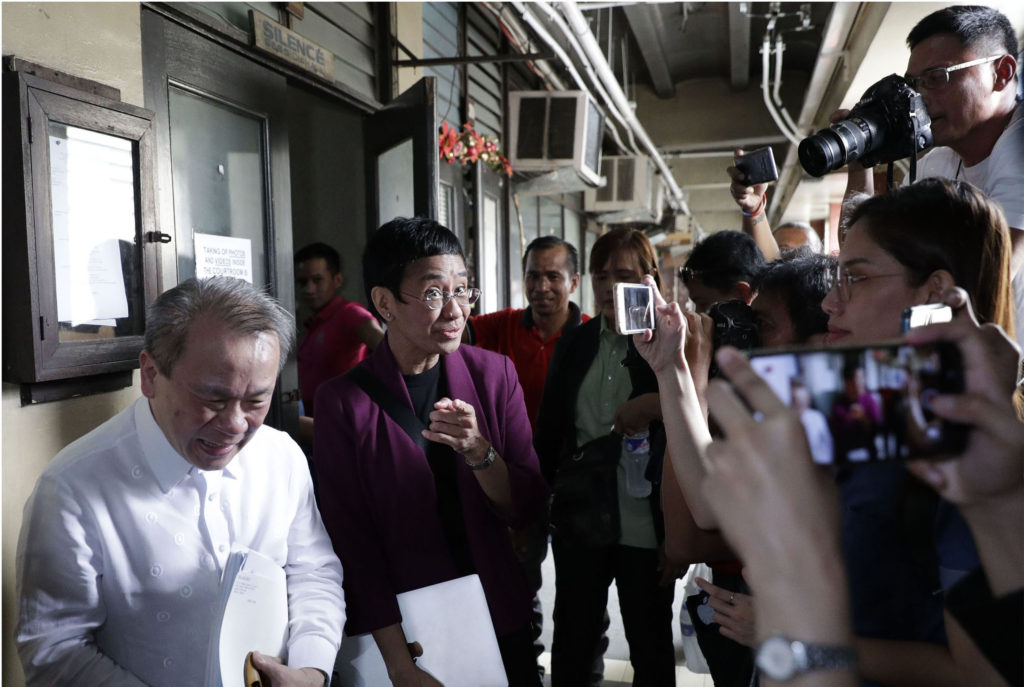 Filipina editor Maria Ressa at a press conference