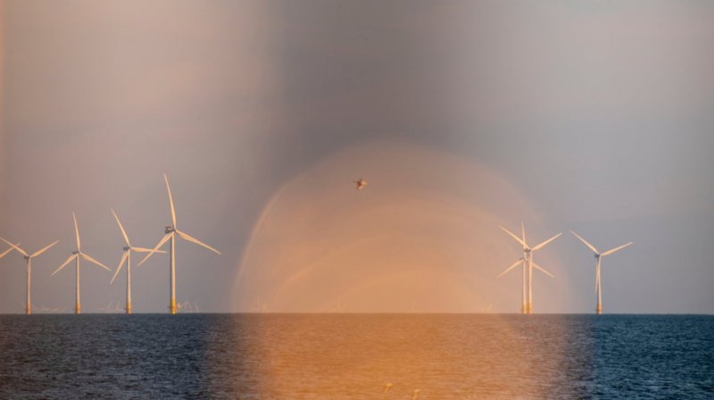 Wind turbines in the ocean.