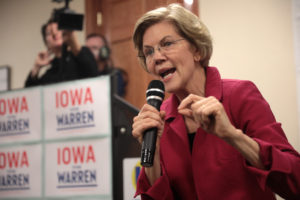 Sen. Elizabeth Warren, D-Mass., addresses the NAACP in Des Moine, IA.