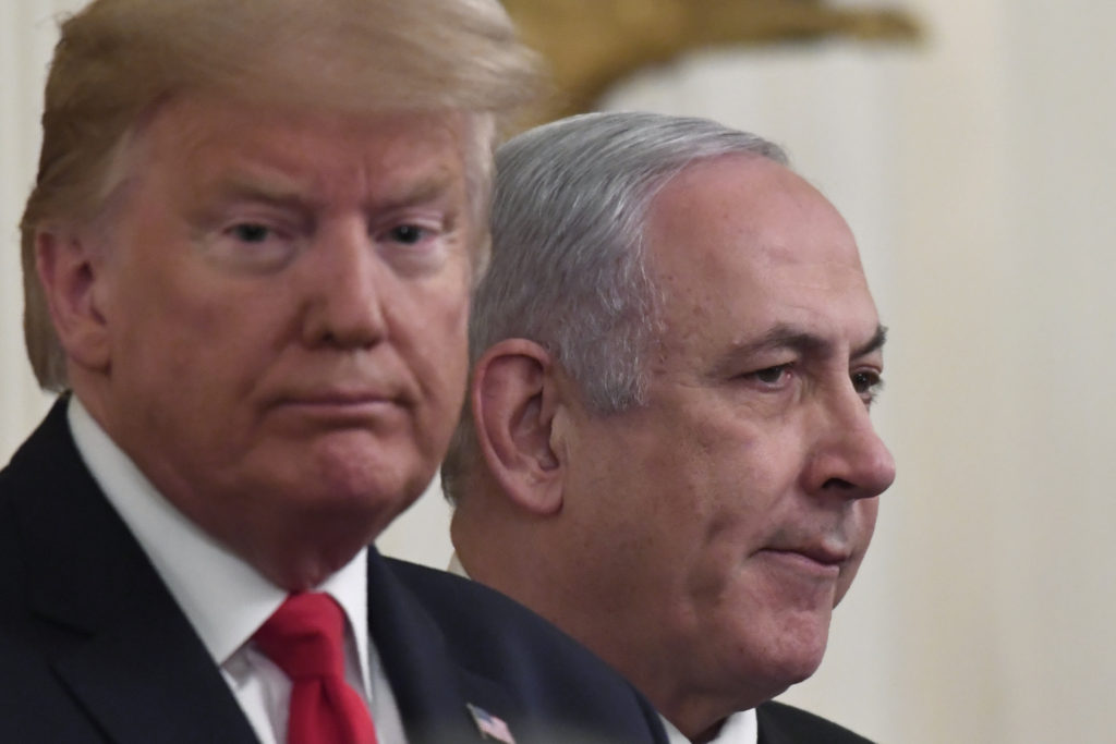 President Donald Trump, left, is joined at the White House by Israeli Prime Minister Benjamin Netanyahu, right, to announce his plan to resolve the Israeli-Palestinian conflict.