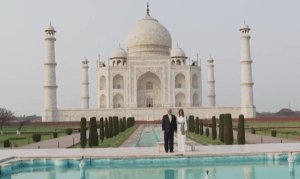 Donald and Melania Trump pose in front of the Taj Mahal