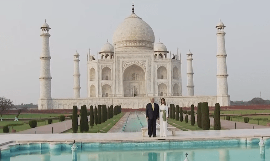 Donald and Melania Trump pose in front of the Taj Mahal