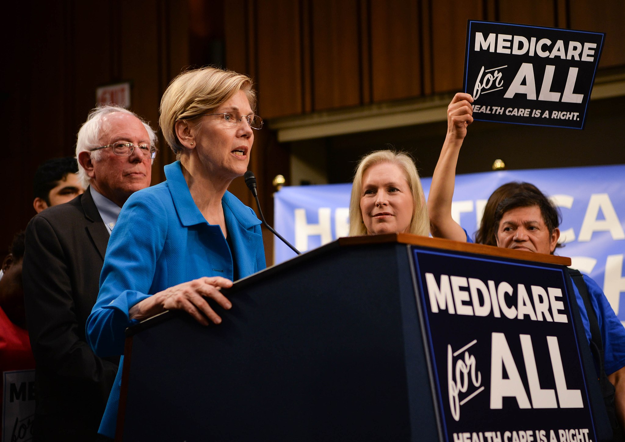 Elizabeth Warren and Bernie Sanders appear at a Medicare for All rally