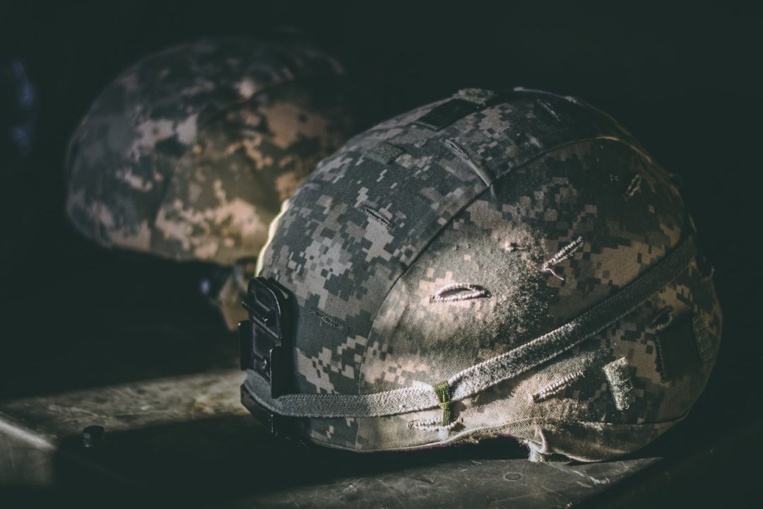 An image of an camouflage army helmet
