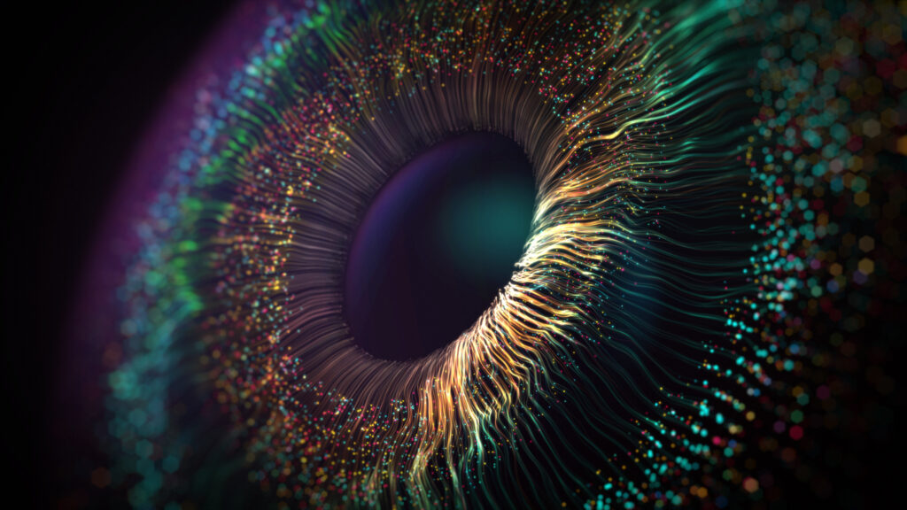 An illustration of an extreme close-up of the human eye, featuring a multi-colored iris surrounding a dark, black pupil.